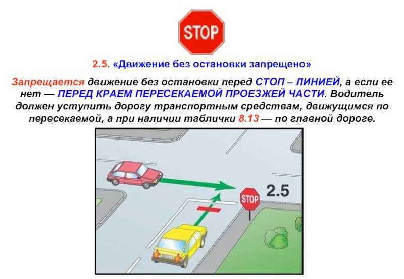 Светофор и знак "стоп" перед железнодорожным переездом
